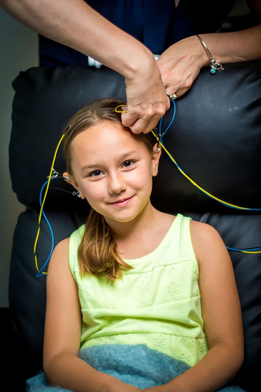 Girl smiling at camera during NeurOptimal Session